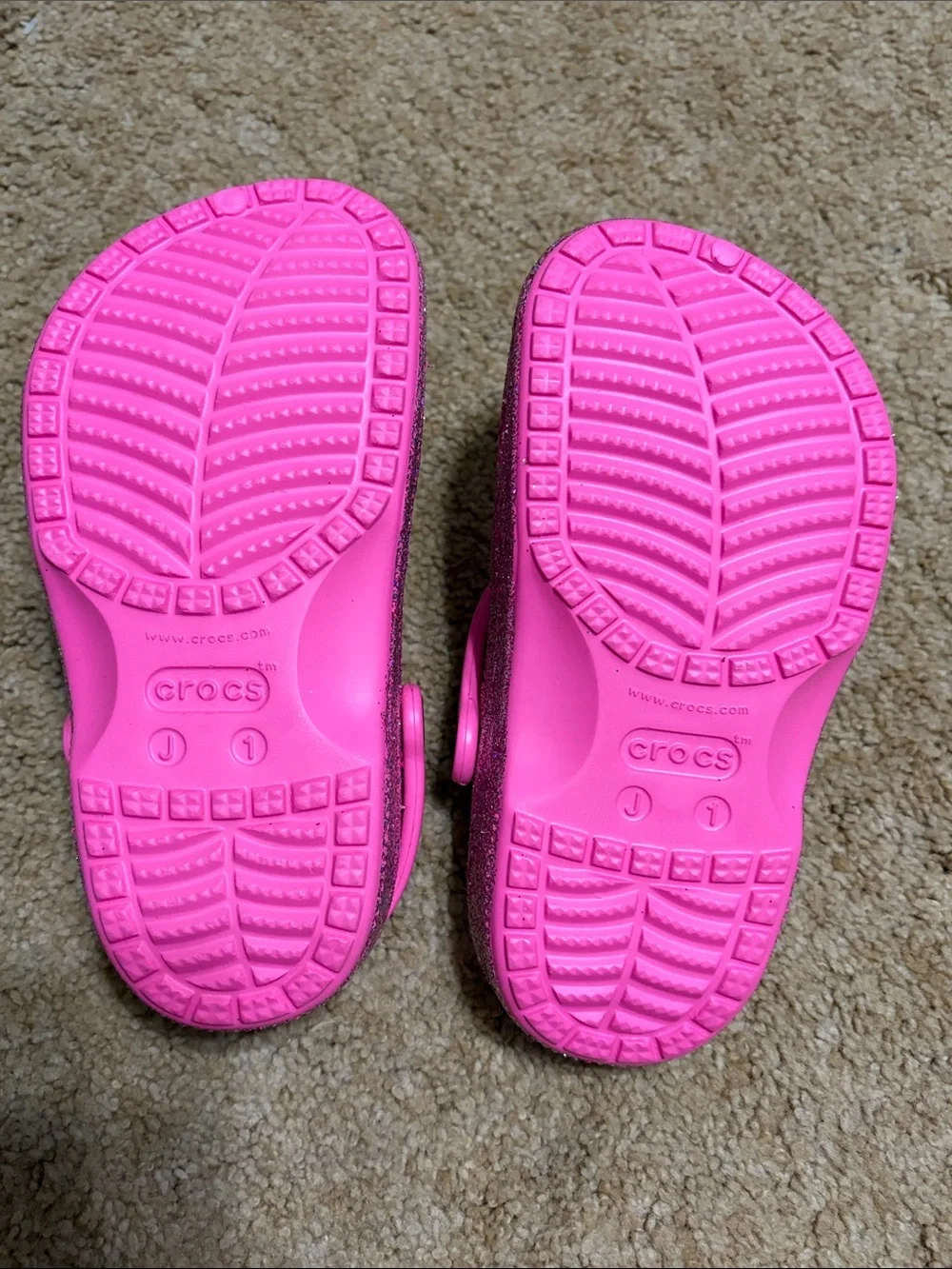 Never worn CROCS Kids Glitter Pink Clogs with Heel Strap